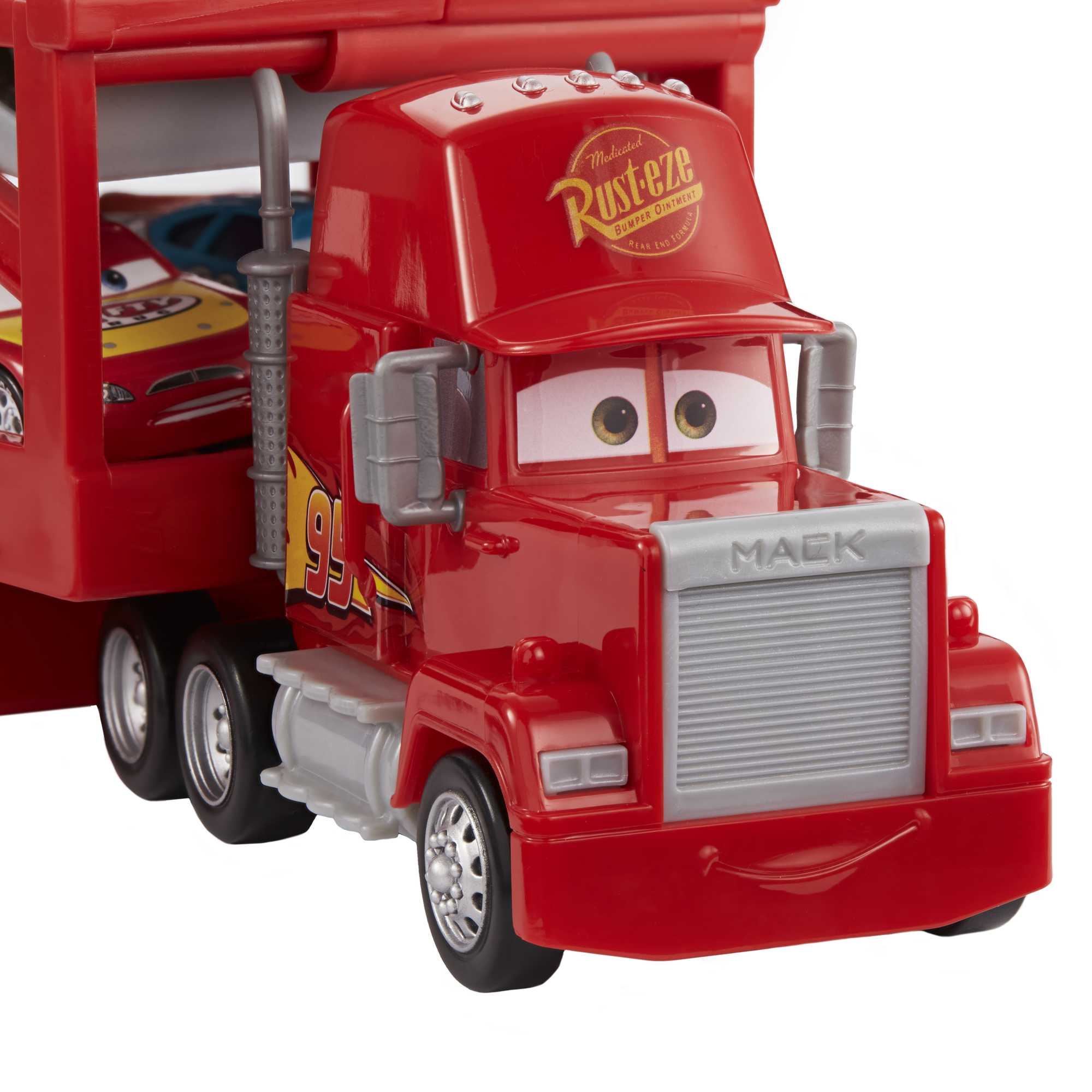 Disney Pixar Cars Mack Trasportatore, Camion Da 33 Cm Con Rampa Per Trasportare 12 Macchinine - Image 3